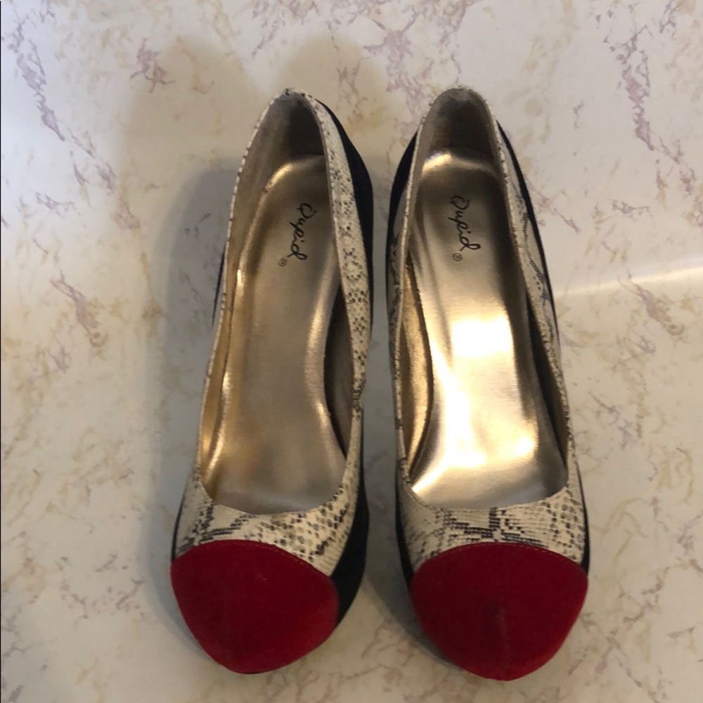 Red, black and white pumps